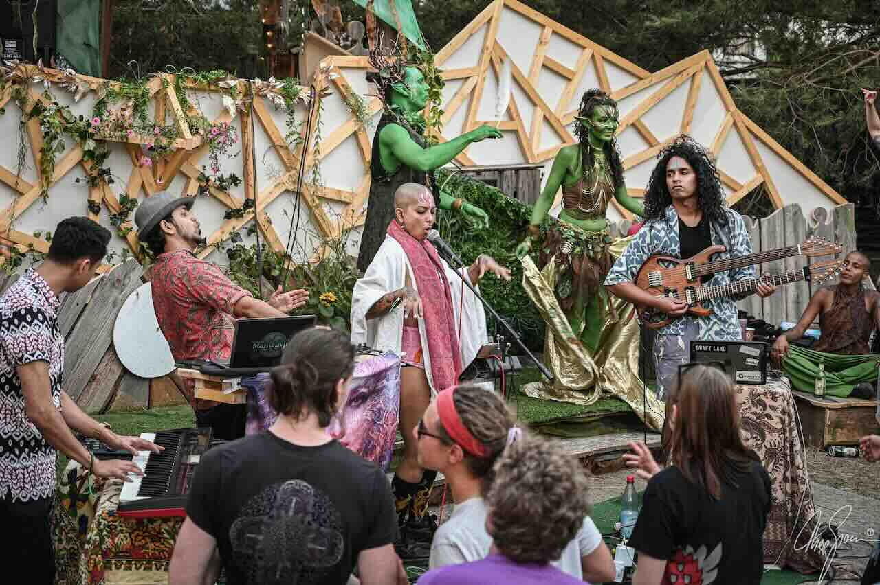 Mantravine stage setup for Singapore show Mantravine outdoor festival performance in Singapore with crowd dancing
